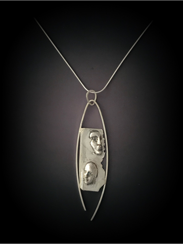 Necklace Featuring Mother and Child