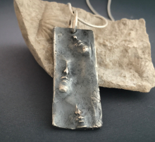 Oxidized silver carved necklace artisan